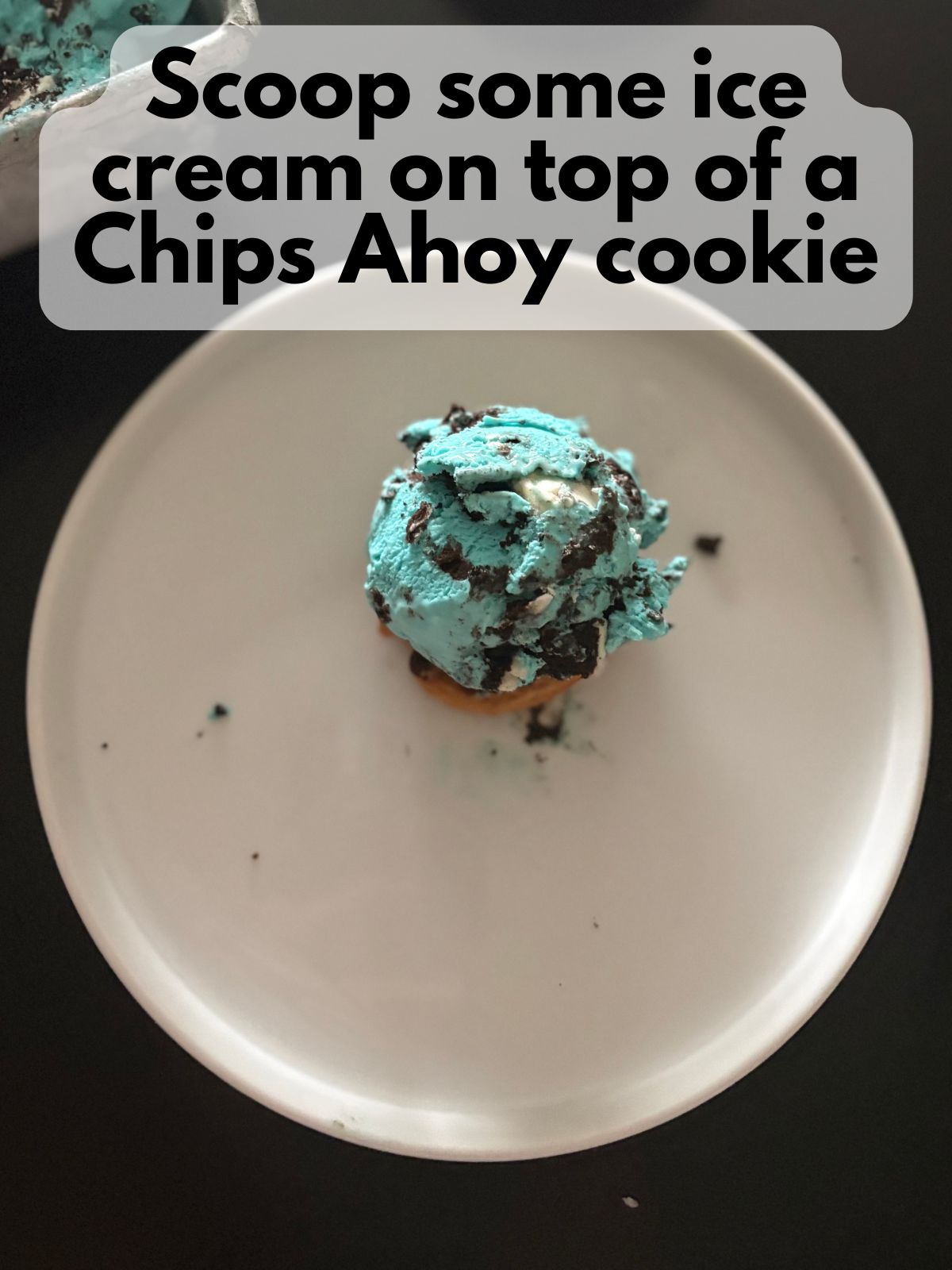 ice cream scooper on top of a chips ahoy cookie