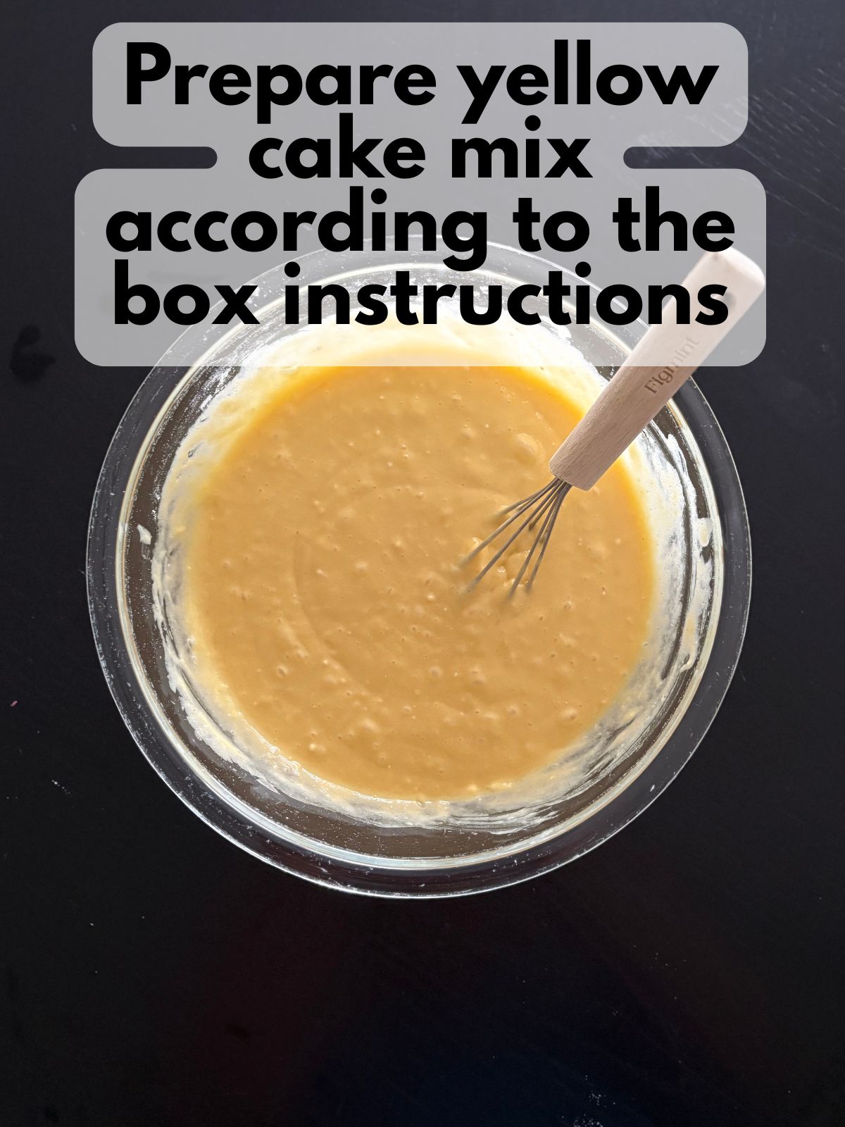 yellow cupcake batter in a mixing bowl