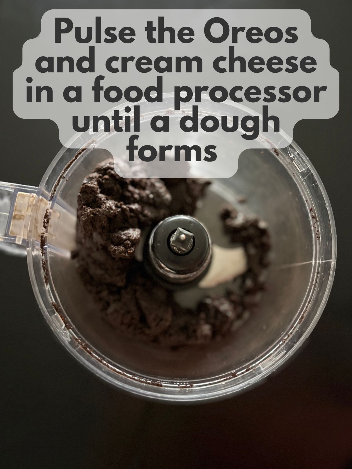 oreos and cream cheese mixed together in a food processor