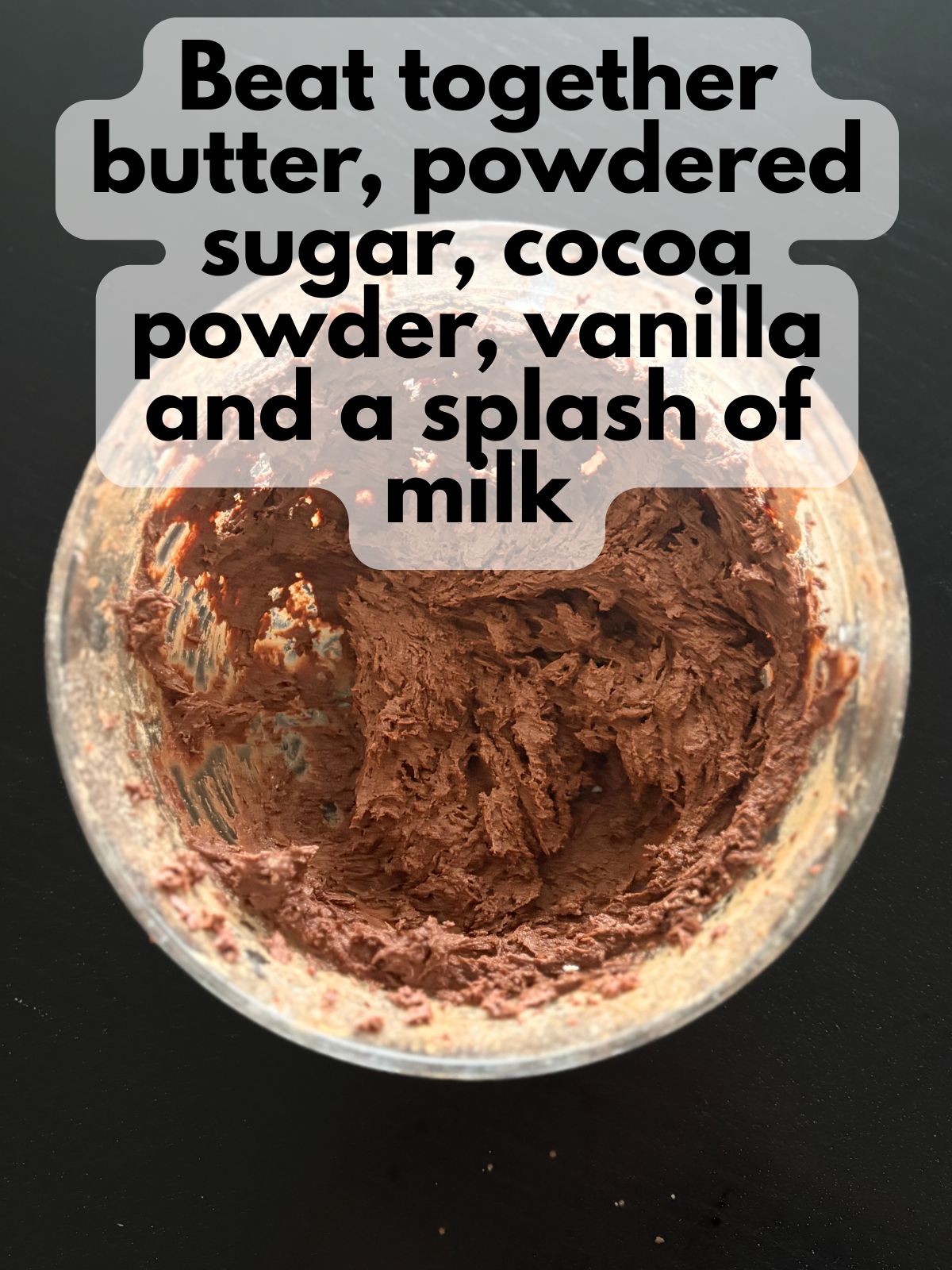 chocolate frosting in a mixing bowl