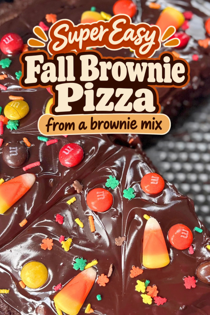 This fall brownie pizza starts with an easy boxed brownie crust and is covered with rich chocolate ganache, colorful candies, and festive fall sprinkles. The thick ganache sets enough for clean slices while remaining smooth and fudgy.