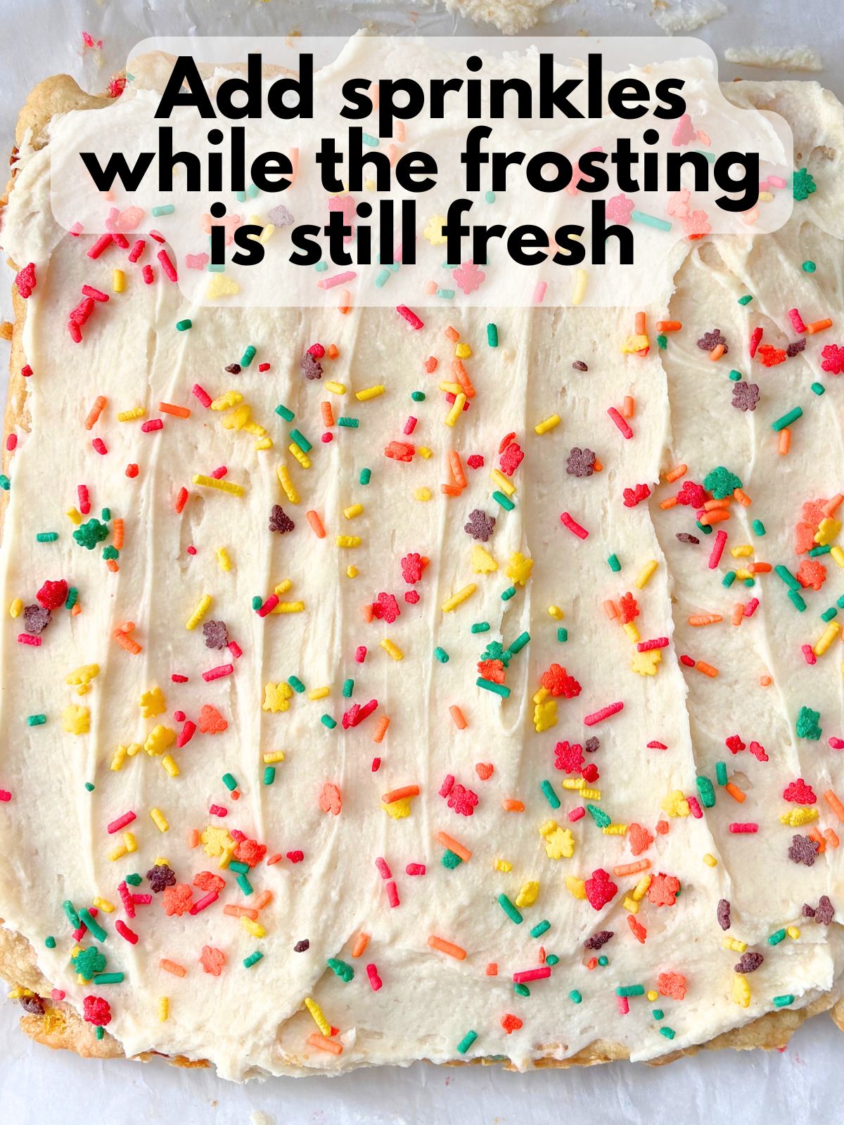 fall sprinkles added on top of frosted cookie bars