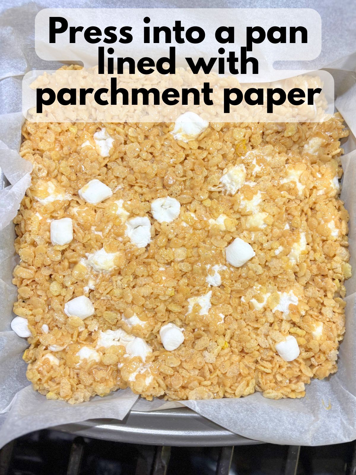 fluffernutter rice krispie treats pressed into a pan