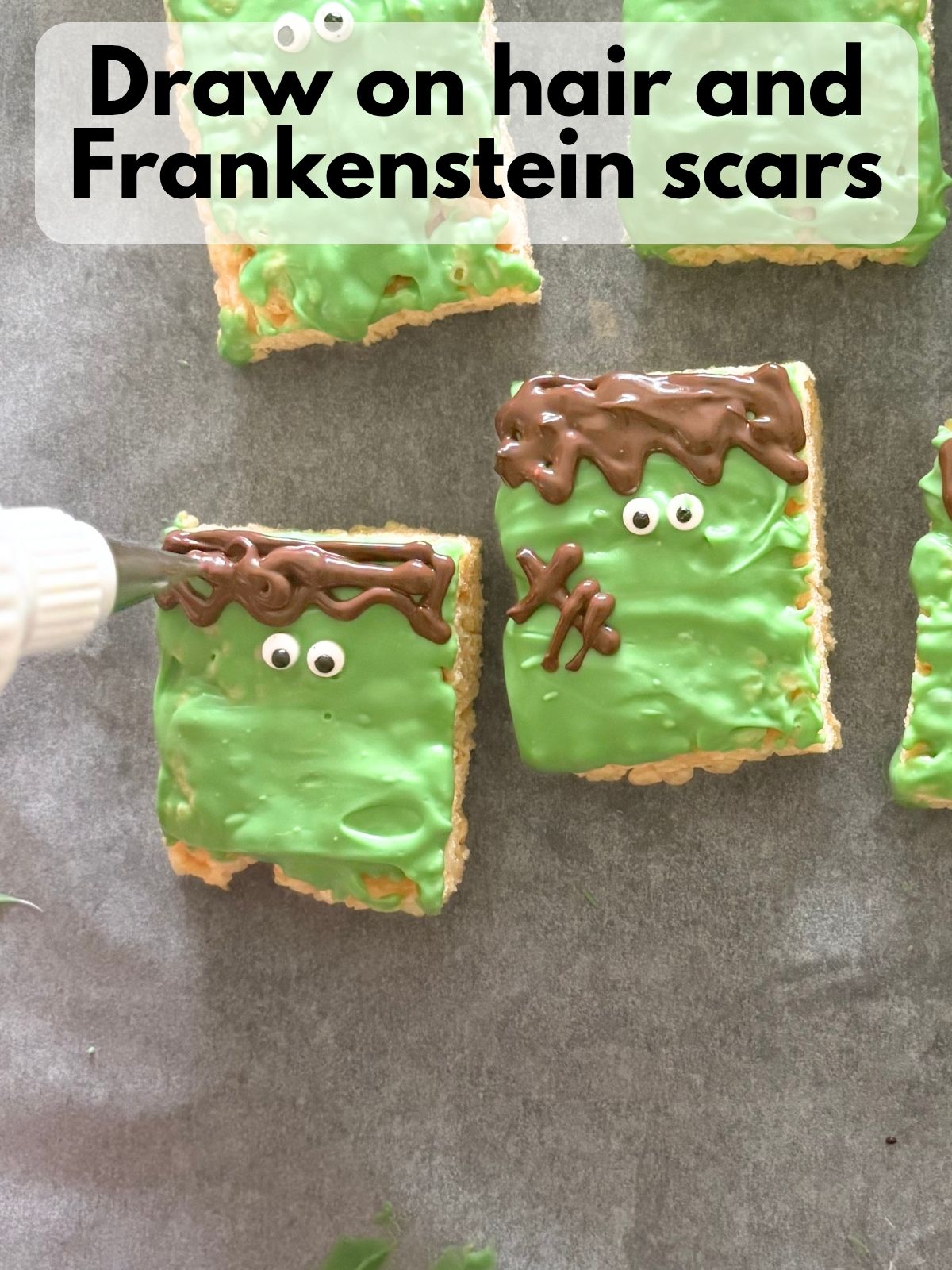 hair and decorations added to frankenstein rice krispie treats