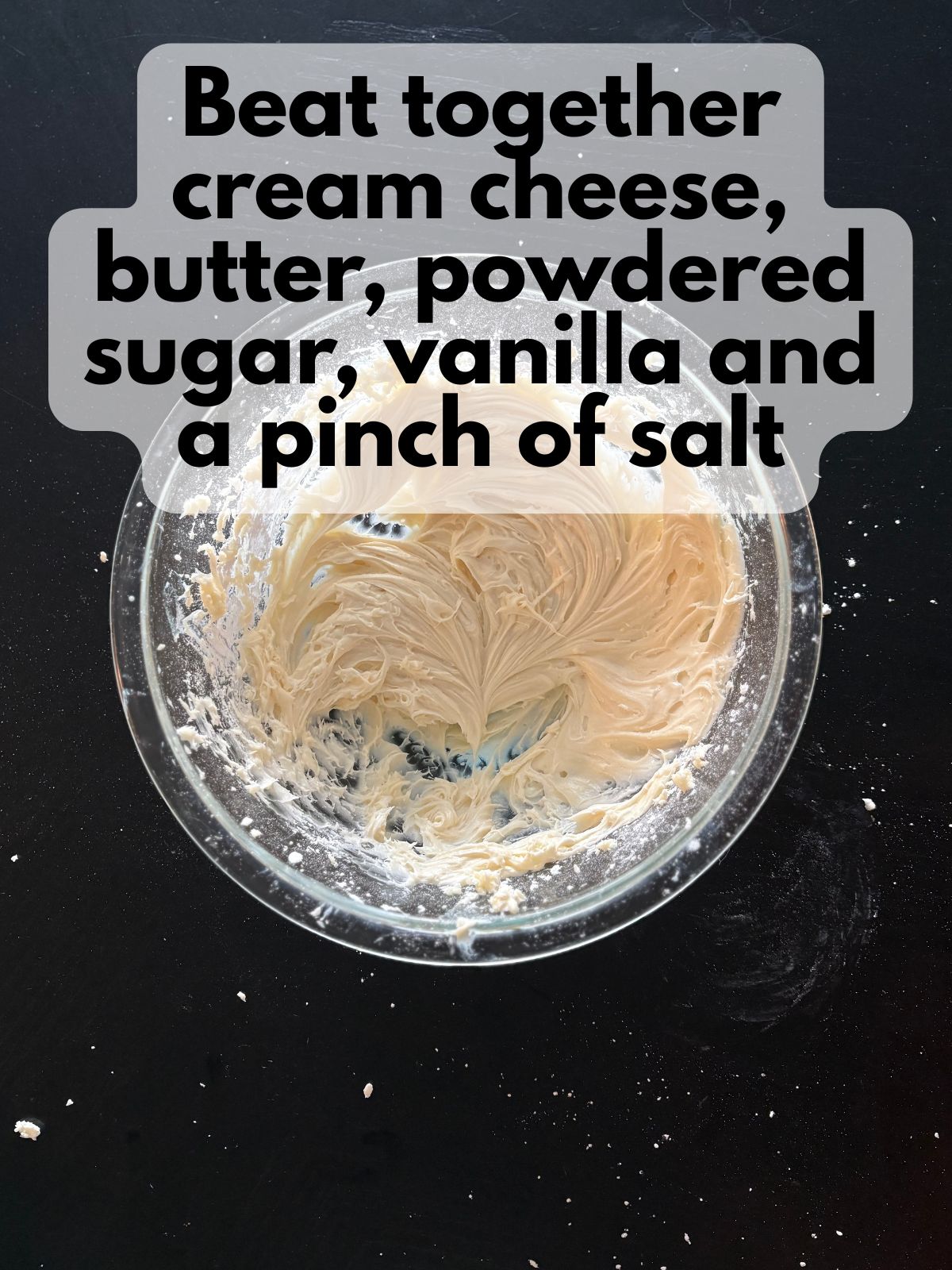 cream cheese frosting in a mixing bowl