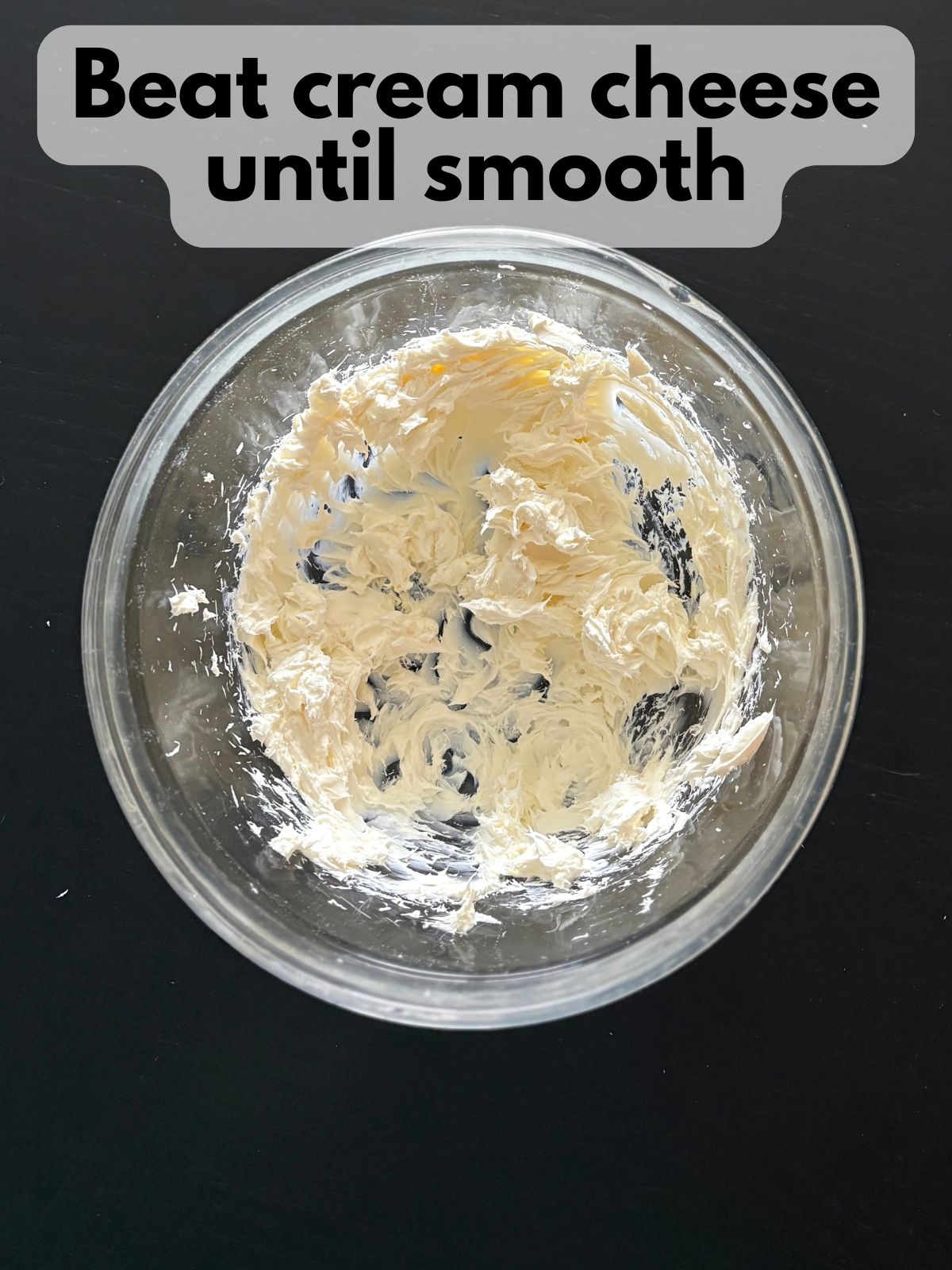 beat cream cheese in a bowl