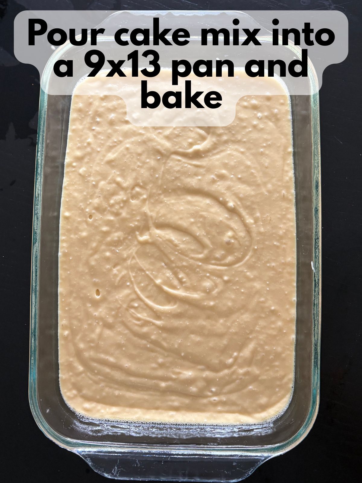 cake batter in a 9x13 pan