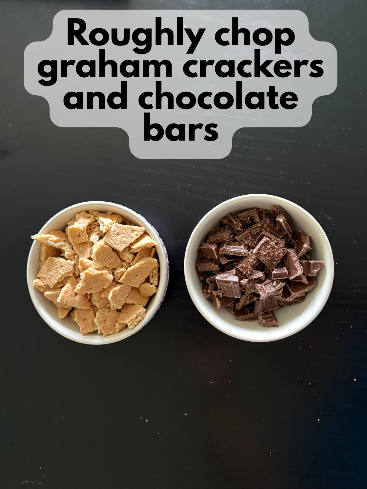 roughly chopped graham crackers and chocolate bars in a bowl