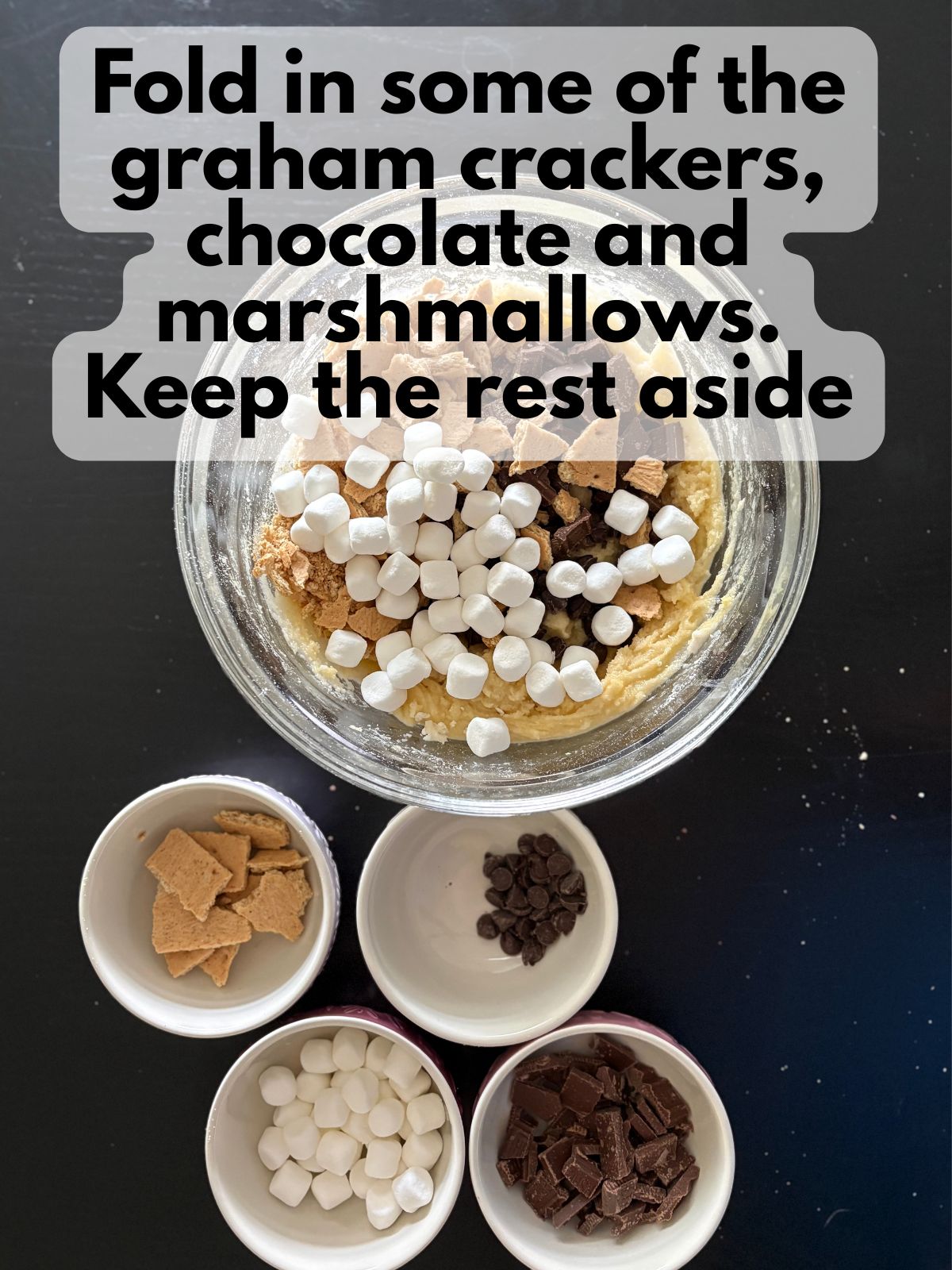mini marshmallows, chocolate, chocolate chips and graham cracker chunks added to yellow cake mix cookie dough