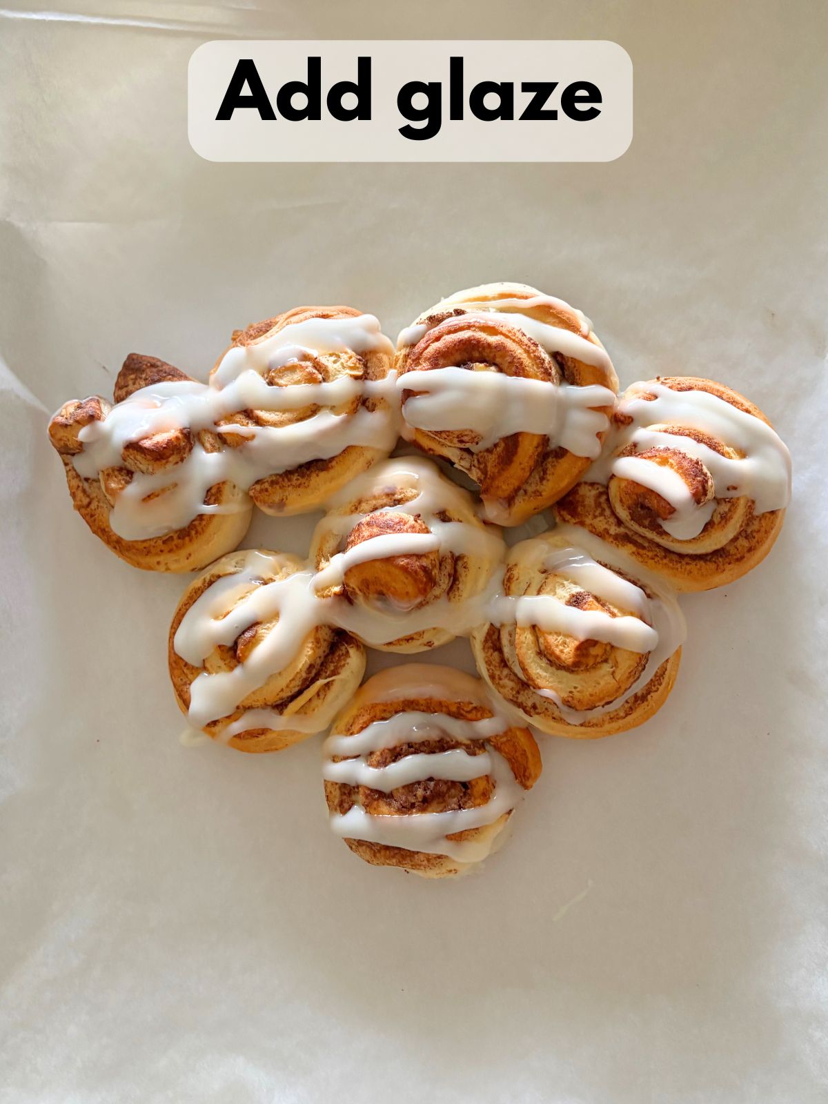 glaze on top of baked cinnamon rolls