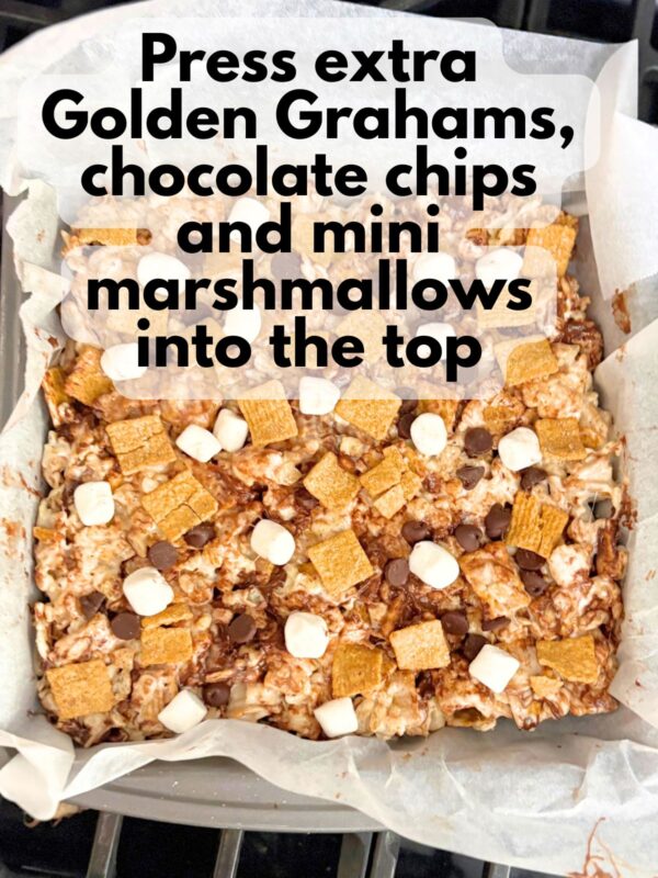 extra chocolate chips, mini marshmallows and Golden Grahams pressed into the tops of s'mores rice krispies treats