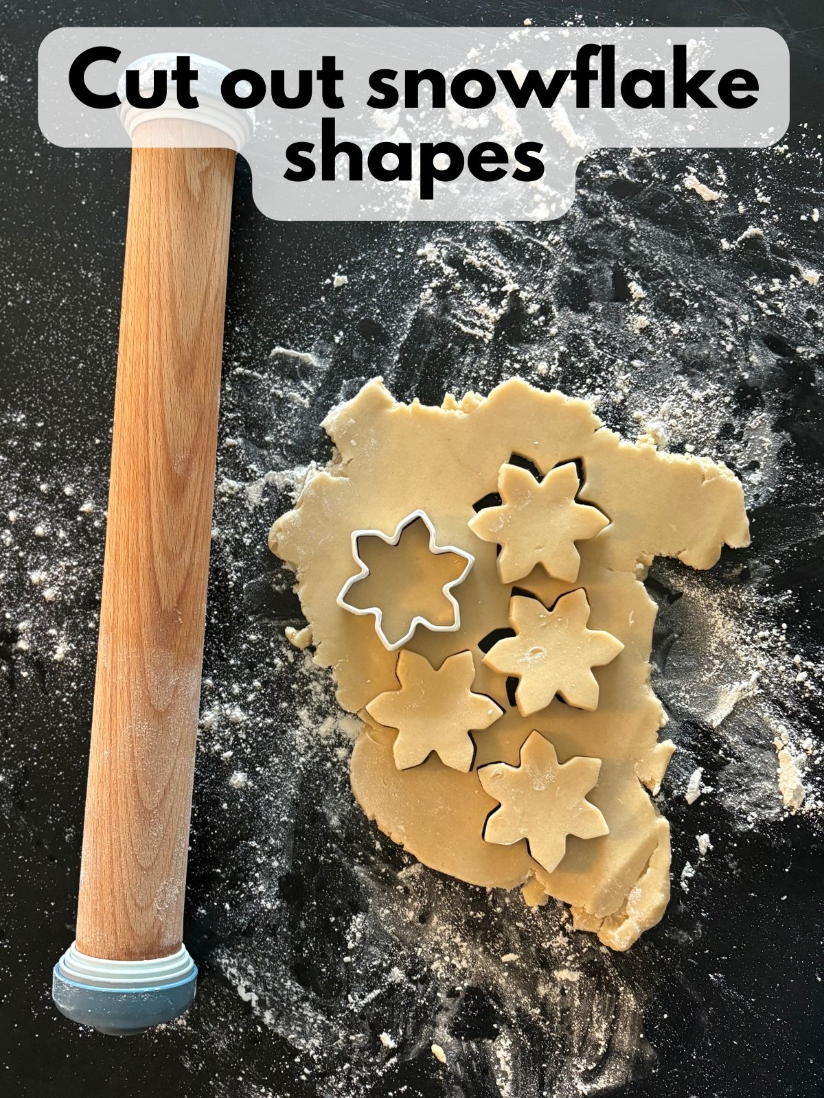 snowflake shapes cut out of dough