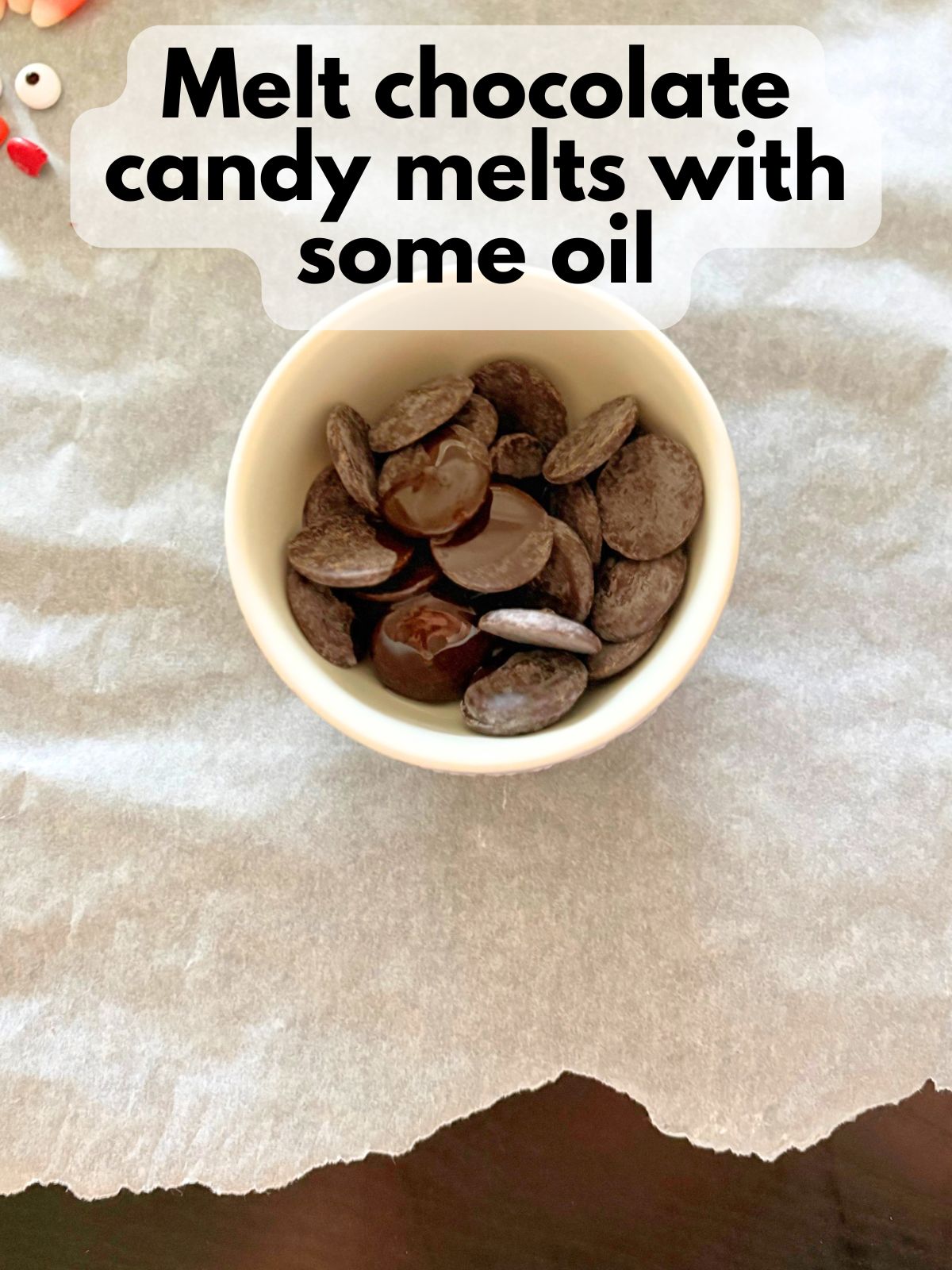 chocolate candy melts in a bowl with oil