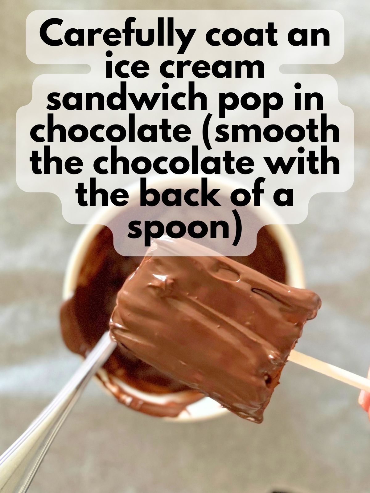 ice cream sandwich pop dipped in melted chocolate